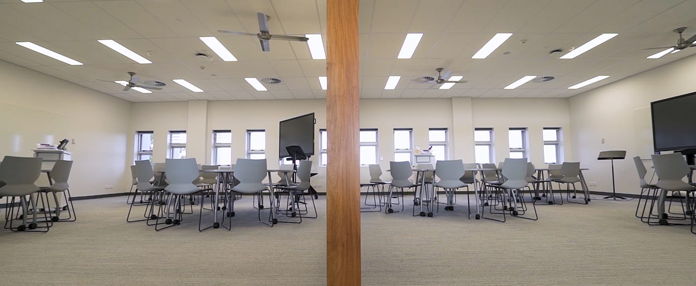 Villanova School with Konfurb fly sled stacking chairs in open classroom