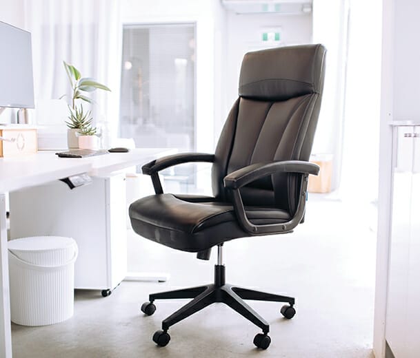 front angle of the buro dakota II black executive chair in modern office