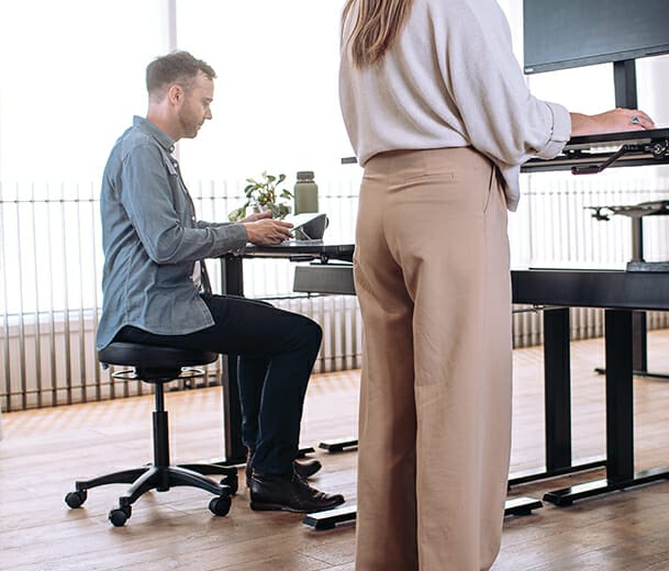 buro polo stool at standing desk in office