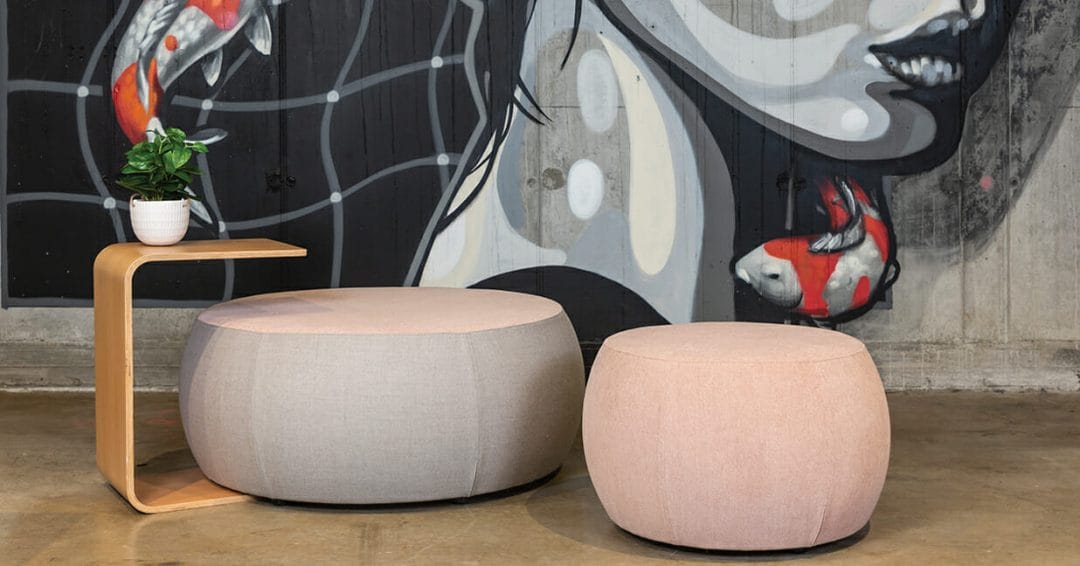 konfurb halo ottomans and konfurb link table in modern office setting