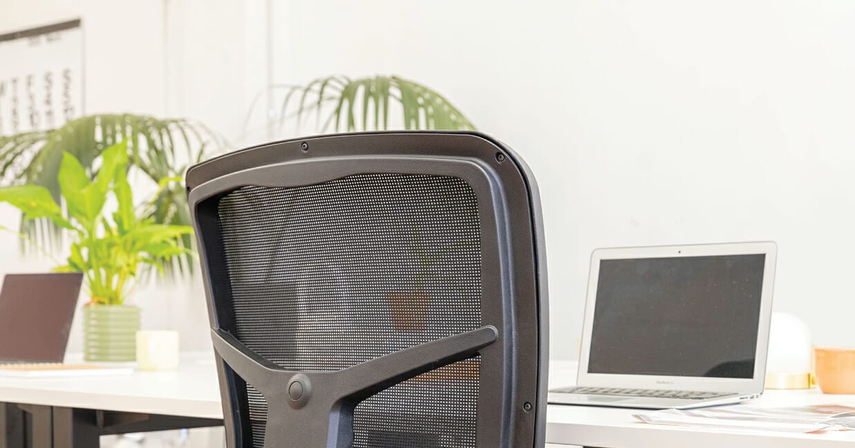 A work-from-home setup and mondo tivoli mesh-backed desk chair