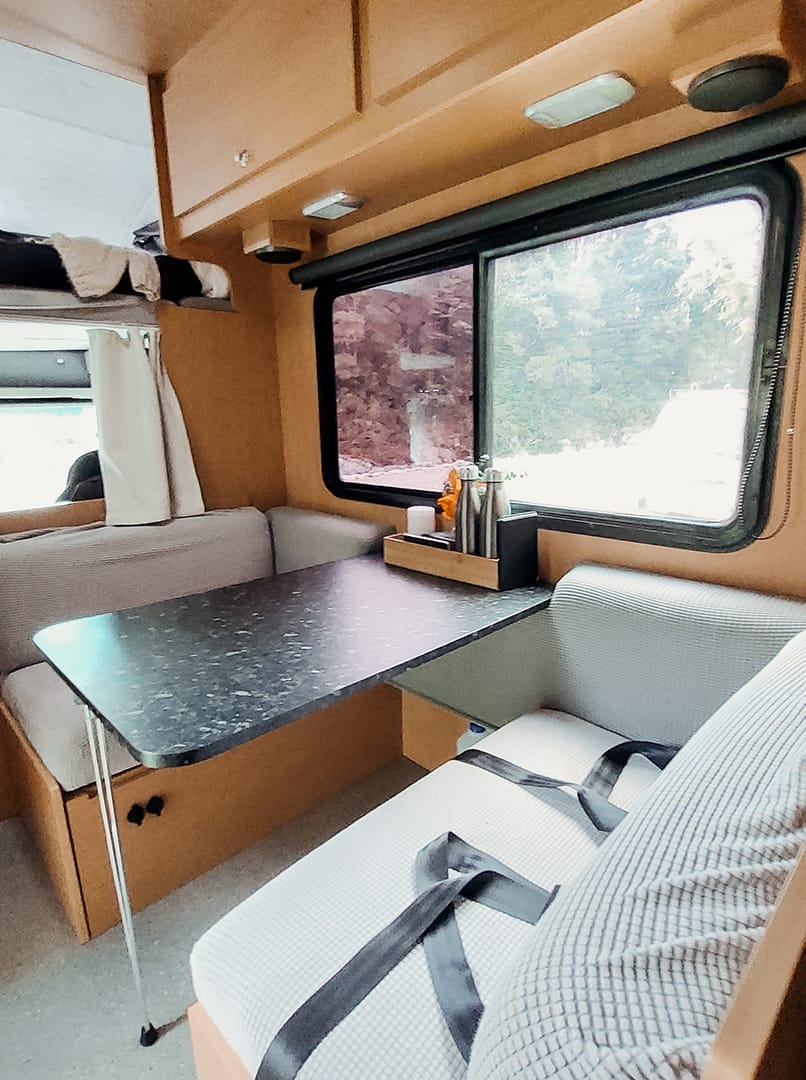 dining area and workspace in the van