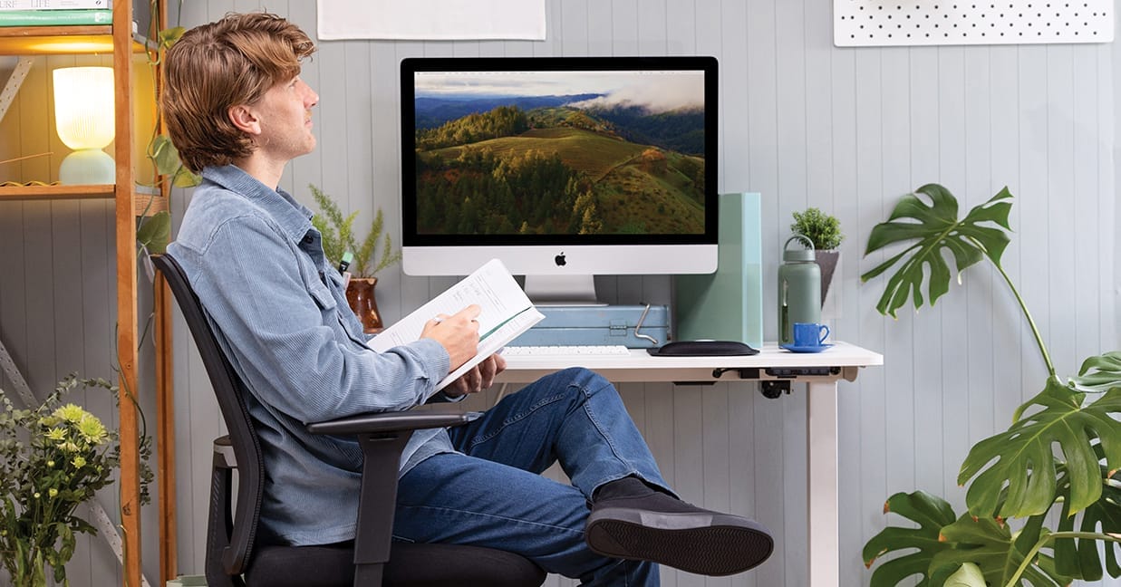 creative man using mondo zone chair and mondo lypta desk